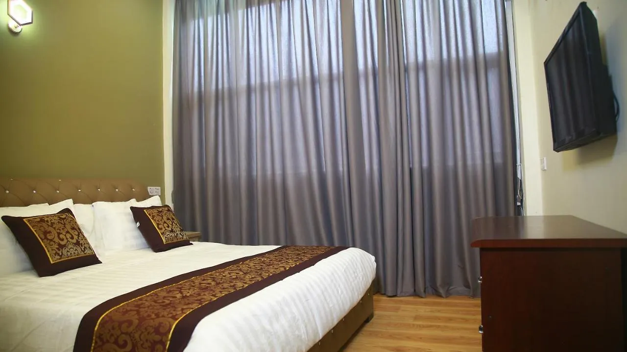 Hotel Shwe Ni Янгон